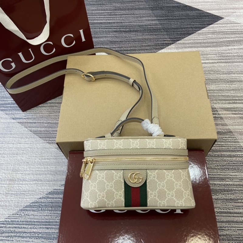 G*u*i cosmetic bags